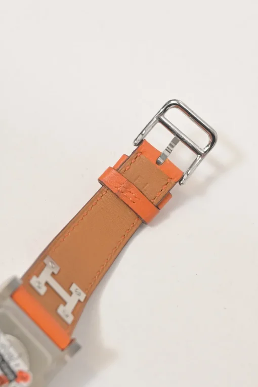 Orange Barenia calfskin and steel Médor watch featuring Swiss-made quartz movement and opaline silvered dial