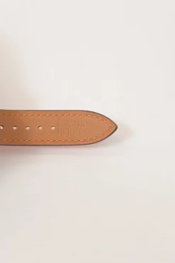 Orange Barenia calfskin and steel Médor watch featuring Swiss-made quartz movement and opaline silvered dial