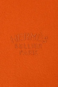Orange cashmere double-face fringe stole featuring "Hermès Sellier Paris" broderie motif