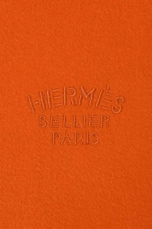 Orange cashmere double-face fringe stole featuring "Hermès Sellier Paris" broderie motif