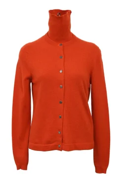 Orange cashmere jersey knit two-piece set with sleeveless turtleneck and crewneck button-front cardigan