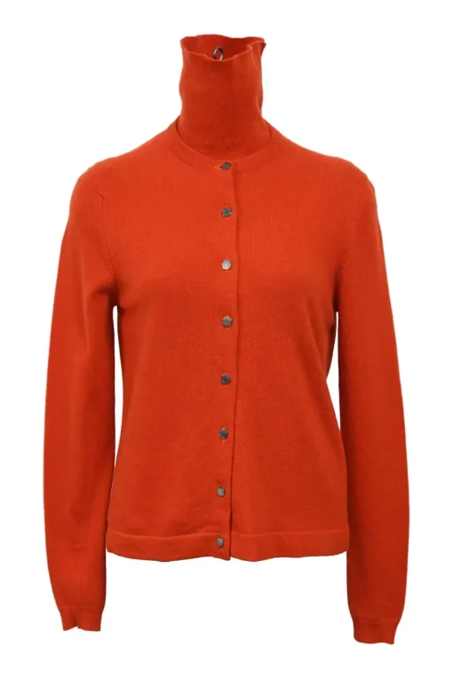Orange cashmere jersey knit two-piece set with sleeveless turtleneck and crewneck button-front cardigan