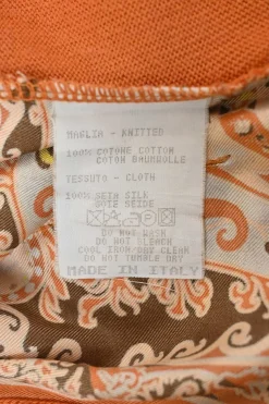 Orange cotton and silk mixed-media interlock jersey knit button-front foulard cardigan featuring woven paisley print panels