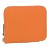 Orange Epsom leather Silk'In change purse featuring Henri d'Origny's 'Mors &amp; Co' printed lining