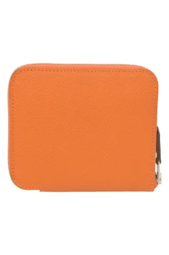 Orange Epsom leather Silk'In change purse featuring Henri d'Origny's 'Mors &amp; Co' printed lining