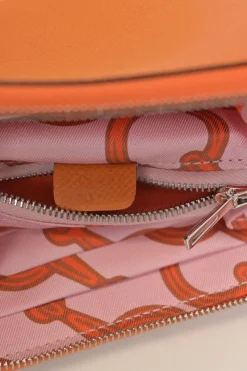 Orange Epsom leather Silk'In change purse featuring Henri d'Origny's 'Mors &amp; Co' printed lining