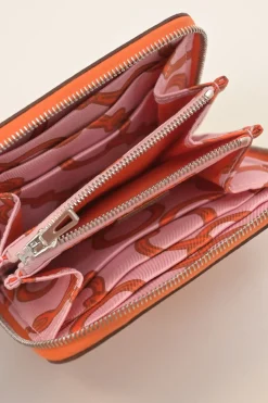 Orange Epsom leather Silk'In change purse featuring Henri d'Origny's 'Mors &amp; Co' printed lining