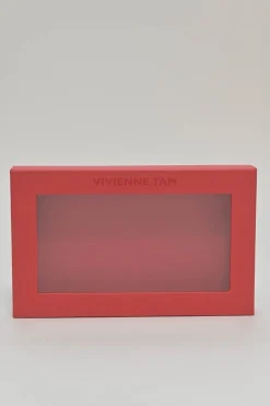 Orange grained printed leather turnlock flap envelope clutch featuring painterly floral motif