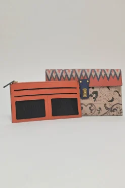 Orange grained printed leather turnlock flap envelope clutch featuring painterly floral motif