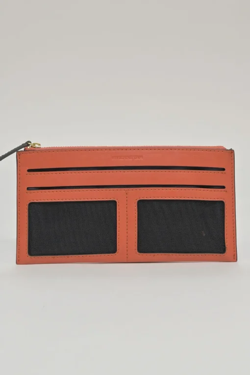 Orange grained printed leather turnlock flap envelope clutch featuring painterly floral motif
