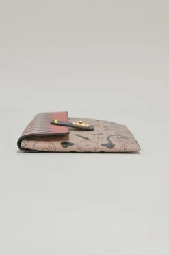 Orange grained printed leather turnlock flap envelope clutch featuring painterly floral motif