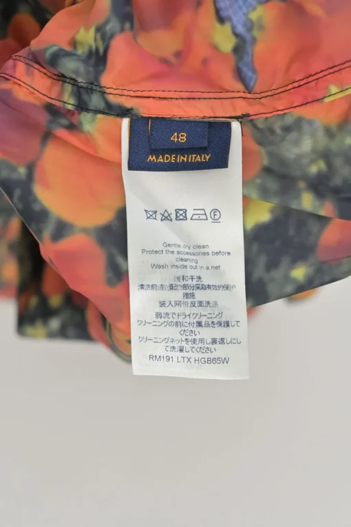 Orange polyamide abstract Dorothy poppies digi-print half-zip pullover windbreaker with toggle hem