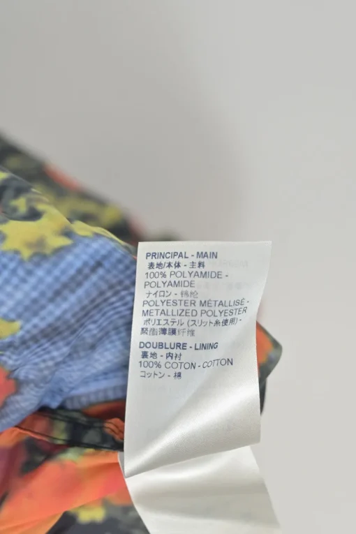 Orange polyamide abstract Dorothy poppies digi-print half-zip pullover windbreaker with toggle hem