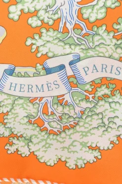 Orange silk 'Sur Mon Nuage' square scarf featuring original artwork by Dimitri Rybaltchenko