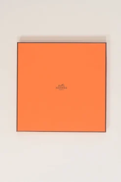 Orange silk 'Sur Mon Nuage' square scarf featuring original artwork by Dimitri Rybaltchenko