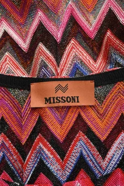 Orange viscose-blend glitter fully-fashioned chevron warp-knit tank top and mini skirt set.