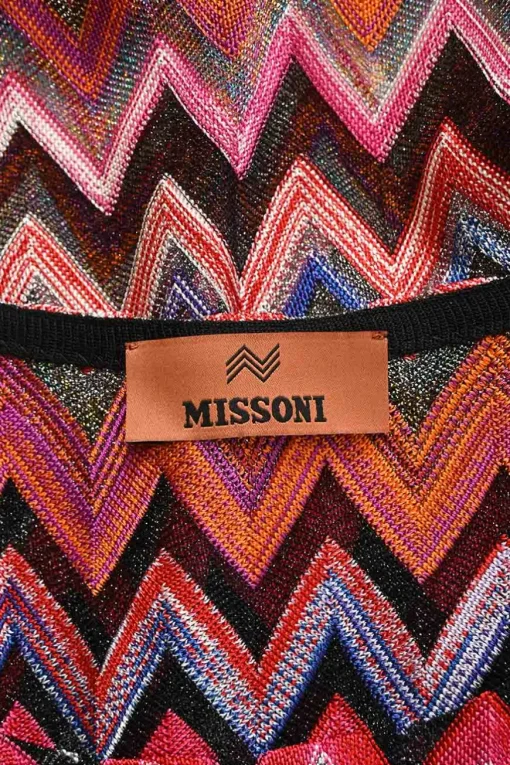 Orange viscose-blend glitter fully-fashioned chevron warp-knit tank top and mini skirt set.