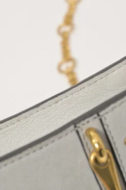 Pale blue leather Pixie convertible shoulder and belt bag with gold-finish metallic hardware