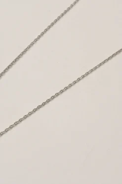 Palladium-plated silver-tone metal and pink enamel Pop H solitaire pendant necklace with lobster clasp closure