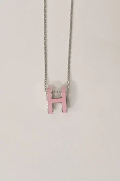Palladium-plated silver-tone metal and pink enamel Pop H solitaire pendant necklace with lobster clasp closure
