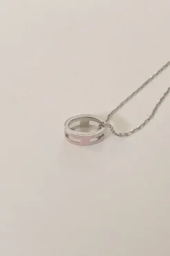 Palladium-plated silver-tone metal and pink enamel Pop H solitaire pendant necklace with lobster clasp closure