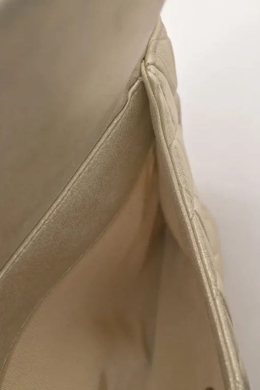 Pearl gold foiled matelassé lambskin drawstring In Seoul backpack with chainlink straps