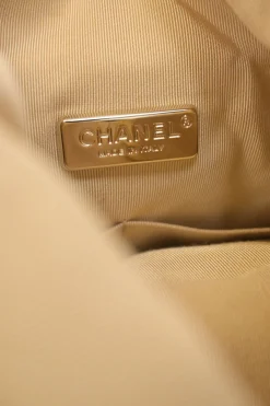 Pearl gold foiled matelassé lambskin drawstring In Seoul backpack with chainlink straps