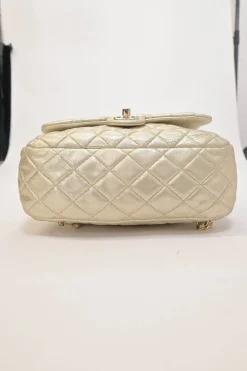 Pearl gold foiled matelassé lambskin drawstring In Seoul backpack with chainlink straps