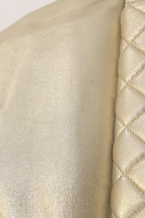 Pearl gold foiled matelassé lambskin drawstring In Seoul backpack with chainlink straps