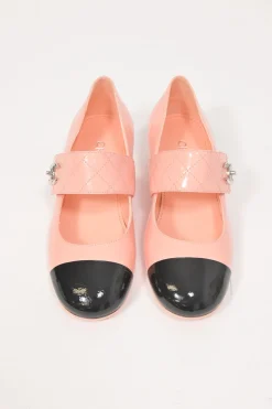 Pink and black patent leather square-toe Mary Jane pumps with Coco Mark instep strap and mirrored stacked heels