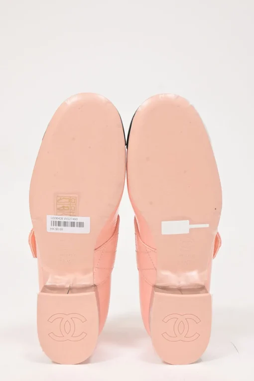 Pink and black patent leather square-toe Mary Jane pumps with Coco Mark instep strap and mirrored stacked heels