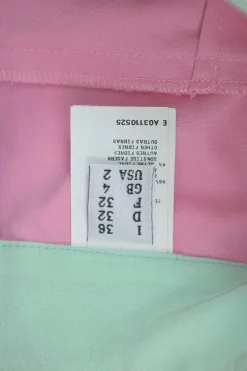 Pink and mint cotton pull-on high-rise piped sailor shorts with exposed button fly