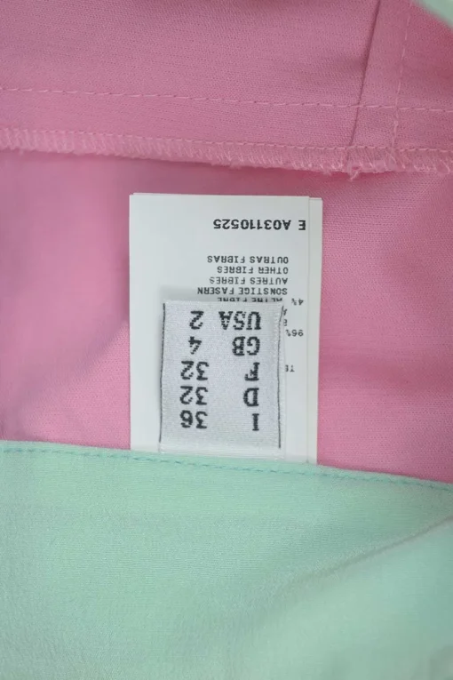 Pink and mint cotton pull-on high-rise piped sailor shorts with exposed button fly
