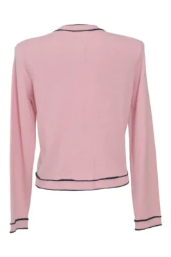 Pink cashmere button-front cardigan jacket with metallic No. 5 house code shank buttons