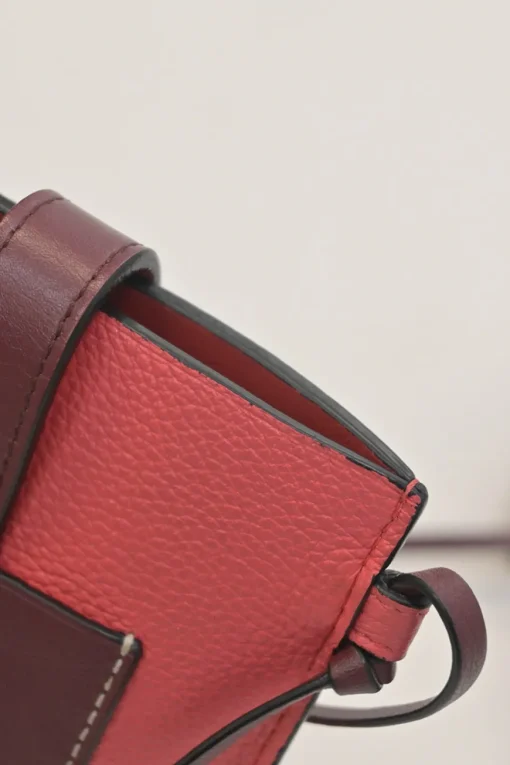 Pink grained calfskin pocket crossbody phone case pochette