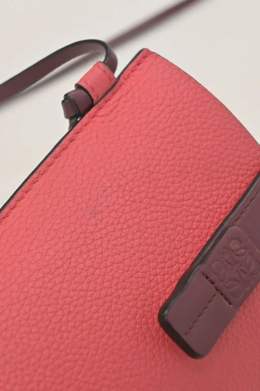 Pink grained calfskin pocket crossbody phone case pochette