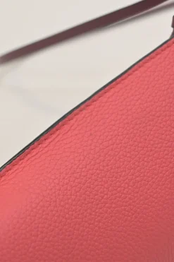 Pink grained calfskin pocket crossbody phone case pochette