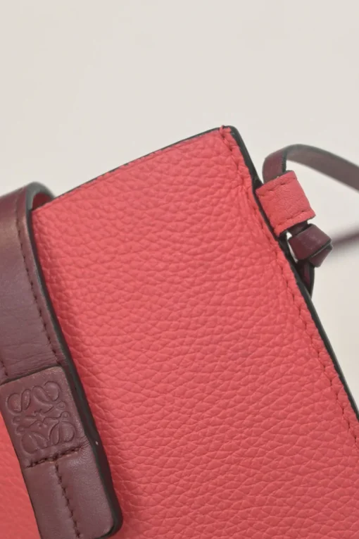 Pink grained calfskin pocket crossbody phone case pochette