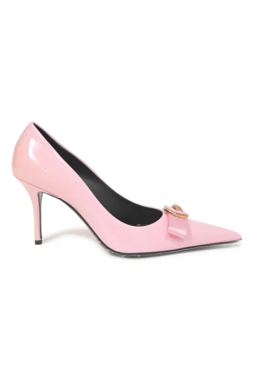 Pink patent leather sharp-point toe Gianni Bow 110 stiletto pumps featuring signature Nastro Gianni bow with enameled Medusa hardware