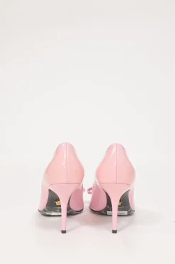 Pink patent leather sharp-point toe Gianni Bow 110 stiletto pumps featuring signature Nastro Gianni bow with enameled Medusa hardware
