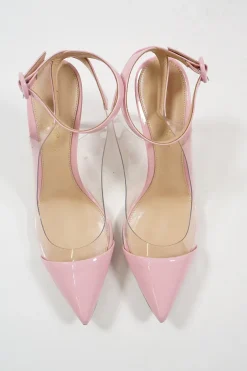 Pink polished calfskin and PVC pointed toe plexi slingback pumps with wraparound buckle ankle strap