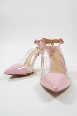 Pink polished calfskin and PVC pointed toe plexi slingback pumps with wraparound buckle ankle strap