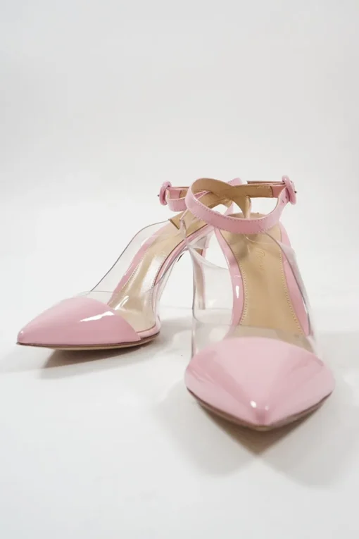Pink polished calfskin and PVC pointed toe plexi slingback pumps with wraparound buckle ankle strap