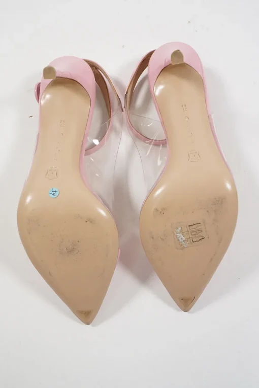 Pink polished calfskin and PVC pointed toe plexi slingback pumps with wraparound buckle ankle strap