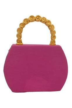 Pink structured mini handbag with solid gold handle imprinted swirls