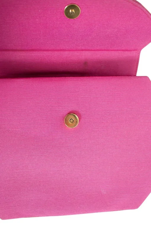 Pink structured mini handbag with solid gold handle imprinted swirls