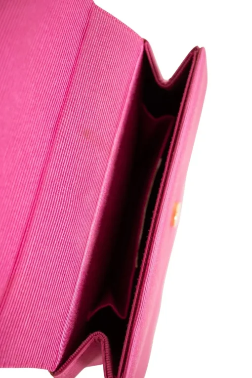 Pink structured mini handbag with solid gold handle imprinted swirls