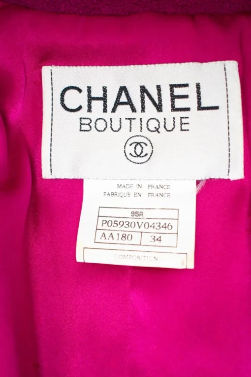 Plum purple long blazer with 2 front pockets and skirt set with gold CC hardware on purple resin buttons