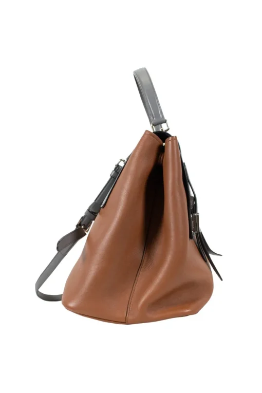 Prada single top handle bag in camel with contrasting grey flap.