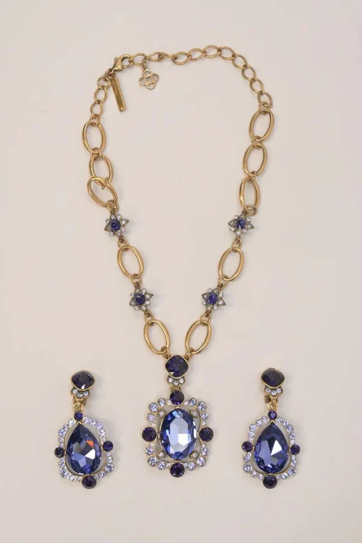 Purple crystal gem-embellished brass necklace and clip-back drop earring costume jewellery set